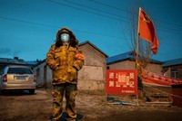 Thành phố Cáp Nhĩ Tân bị phong tỏa để ngăn chặn sự lây lan của dịch COVID-19. (Nguồn: AFP).