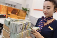 Tỷ giá hiện dao động trong khoảng 23.250-23.300 VND/USD, tương đương thời điểm đầu tháng 3.