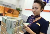 Theo ước tính của Bộ Tài chính, thu ngân sách cả năm 2020 giảm 12,5% so với dự toán vì nhiều lý do khác nhau. Ảnh: Đức Thanh.