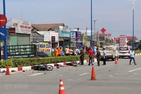 Hiện trường vụ tai nạn giao thông khiến 3 người thương vong.( Ảnh: TTXVN phát).