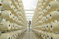 Dây chuyền sợi xuất khẩu tại Công ty TNHH dệt Phú Thọ. (Ảnh: TTXVN).