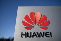 Biểu tượng Huawei. (Ảnh: AFP/TTXVN).