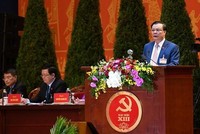 Bộ trưởng Bộ Tài chính Đinh Tiến Dũng phát biểu tham luận tại Đại hội Đảng lần thứ XIII - Ảnh: VGP/Nhật Bắc.