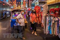 Người dân đeo khẩu trang phòng lây nhiễm COVID-19 tại Bangkok, Thái Lan, ngày 11/2/2021. (Ảnh: THX/TTXVN).