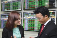 Một số công ty chứng khoán tự nguyện sẽ chuyển sàn để giảm tải cho hệ thống giao dịch của HOSE. Ảnh: Dũng Minh.