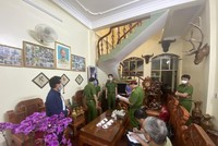 Cơ quan công an đọc lệnh bắt bà Nguyễn Thị Kim An.