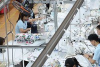 Các đơn hàng của May Sông Hồng đã ổn định tới hết quý III/2021. Ảnh: Dũng Minh.