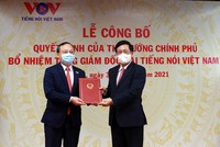 Phó Thủ tướng Chính phủ Phạm Bình Minh trao quyết định bổ nhiệm Tổng Giám đốc Đài Tiếng nói Việt Nam (TNVN) cho ông Đỗ Tiến Sỹ. Ảnh: VGP/Hải Minh.