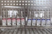 Vaccine Sputnik V phòng COVID-19 do Viện nghiên cứu dịch bệnh và vi trùng học Gamaleya của Nga phát triển. (Ảnh: Bloomberg/TTXVN).