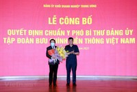Ông Huỳnh Quang Liêm (trái) là Phó bí Thư Đảng ủy Tập đoàn VNPT nhiệm kỳ 2020-2025. (Ảnh: T.Q).