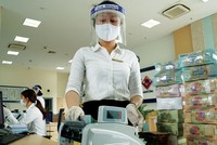 Mới đây, BIDV giảm lãi suât cho vay doanh nghiệp từ 1-2%/năm. Ảnh Dũng Minh.