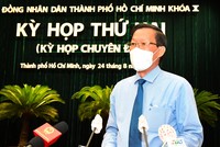 Ủy viên Trung ương Đảng, Phó Bí thư Thường trực Thành ủy, Chủ tịch UBND TPHCM, Trưởng đoàn đại biểu Quốc hội TPHCM Phan Văn Mãi trình bày chương trình hành động tại kỳ họp thứ hai HĐND TPHCM khóa 10, ngày 24/8. Ảnh: VGP/Việt Dũng.