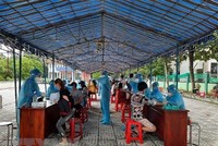 Khu vực triển khai tiêm vaccine Vero Cell tại xã Phú An, thị xã Bến Cát, tỉnh Bình Dương. (Ảnh: TTXVN).