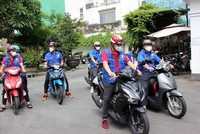 Các thành viên đội Shipper tình nguyện tại Thành phố Hồ Chí Minh. (Ảnh: Xuân Khu/TTXVN).