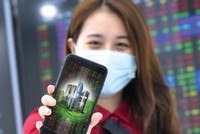 Cổ phiếu bất động sản vừa có đợt sóng tăng mới. Ảnh: Dũng Minh.