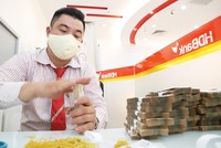 Ngành ngân hàng đã có 1 năm vượt khó thành công, tiếp tục đồng hành hỗ trợ doanh nghiệp hồi phục sản xuất - kinh doanh.