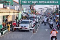 Người dân “nối đuôi” nhau về Thành phố Hồ Chí Minh sau kỳ nghỉ Tết Nguyên đán. (Ảnh: TTXVN phát).