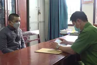 Đối tượng Nguyễn Văn Mạnh tại cơ quan công an. (Ảnh: Bộ Công an).