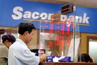 Mới đây, Sacombank đã thông báo tạm “khóa van” đối với tín dụng bất động sản, kể cả cho vay mua nhà. Ảnh: Dũng Minh.