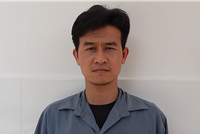 Đối tượng Nguyễn Thành Nguyễn tại cơ quan điều tra. (Ảnh: TTXVN phát)