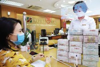 Hôm qua, NHNN thông báo nới room tín dụng toàn hệ thống năm nay thêm 1,5 - 2%.