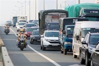 Cảnh sát điều tiết giao thông trên tuyến đường Vành đai 3 (Hà Nội), tháng 9/2022. (Ảnh: Phạm Kiên/TTXVN)