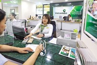 Năm 2022, lợi nhuận trước thuế riêng lẻ của Vietcombank đạt gần 36.800 tỷ đồng, tăng 39% so với năm 2021. Ảnh: Đức Thanh.