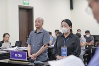 Các bị cáo Lương Thế Hiển và Nguyễn Thị Liên tại tòa.