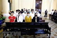 Các bị cáo (tại ngoại) tại phiên tòa sáng 6/6/2023. (Ảnh: Thành Chung/TTXVN)