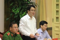 Thứ trưởng Bộ Kế hoạch và Đầu tư Trần Quốc Phương giới thiệu những điểm mới của Luật Đấu thầu (Ảnh TT)