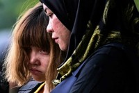 Đoàn Thị Hương khi rời phiên tòa. Ảnh:AFP