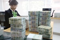 Tỷ lệ nợ xấu của các ngân hàng đã giảm xuống dưới 2%. Trong ảnh: Vietcombank - một ngân hàng tích cực trong xử lý nợ xấu.