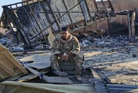 Lính Mỹ tại căn cứ Ain al-Asad sau cuộc tấn công hôm 8/1. Ảnh: CNN.