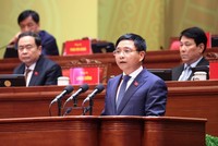 Bộ trưởng Bộ Tài chính Nguyễn Văn Thắng trình bày tham luận - Ảnh TTXVN.