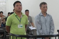 Hai bị cáo tại tòa.