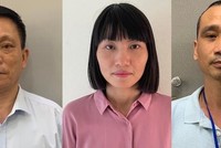 Bị can Phạm Quang Ngữ (tay trái) và cấp dưới.