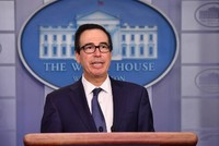 Bộ trưởng Tài chính Mỹ Steven Mnuchin tại cuộc họp báo hôm 16/10. Ảnh: AFP.