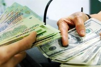 Ngân hàng nước ngoài bình luận gì về việc nâng tỷ giá?