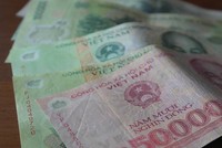 Phá hoại, hủy hoại tiền Việt Nam trái pháp luật sẽ bị phạt tiền