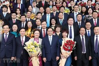 Thủ tướng Chính phủ Phạm Minh Chính gặp gỡ các doanh nghiệp, doanh nhân tiêu biểu hôm 12/12/2021 (Ảnh: TTXVN)