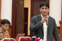 Ông Đặng Ngọc Minh, Phó Tổng cục trưởng Tổng cục Thuế trả lời báo chí tại họp báo chiều 30/3 - Ảnh: M.Minh