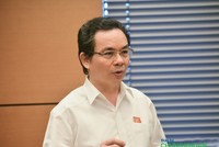 Đại biểu Quốc hội Hoàng Văn Cường (đoàn Hà Nội) thảo luận tại tổ về Luật Nhà ở (sửa đổi) sáng 5/6 (Ảnh: M.M)