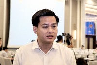 Ông Hoàng Hải, Cục trưởng Cục Nhà ở và Thị trường bất động sản (Bộ Xây dựng) trả lời báo Đầu tư Chứng khoán bên lề Hội thảo sáng 13/7 (Ảnh: M.Minh)