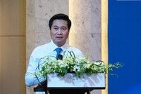 Thứ trưởng Bộ Xây dựng Nguyễn Tường Văn phát biểu chỉ đạo Hội thảo sáng 13/7 (Ảnh: M.MInh)