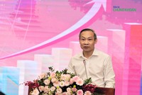 Ông Phan Đức Hiếu, Uỷ viên thường trực Uỷ ban Kinh tế của Quốc hội trình bày tham luận sáng 19/7 (Ảnh: M.Minh)