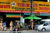 Công an TPHCM kiểm tra trụ sở Công ty Thành Bưởi tại quận 5, TPHCM chiều 26/10.