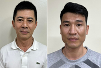 Chủ tịch và Tổng giám đốc Tập đoàn Thuận An, ông Nguyễn Duy Hưng (áo trắng) và Trần Anh Quang (Ảnh: Bộ Công an)