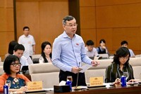 Bộ trưởng Bộ Tài chính Ngô Văn Tuấn báo cáo tại phiên họp 