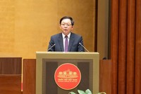 Phó Thủ tướng Chính phủ Hồ Quốc Dũng trình bày trước Quốc hội Báo cáo tiếp thu giải trình dự án Luật sửa đổi, bổ sung một số điều của 10 luật liên quan đến thủ tục hành chính, điều kiện kinh doanh trong lĩnh vực nông nghiệp và môi trường.