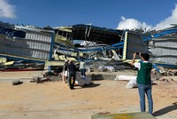 Cán bộ giám định của BIC giám định bồi thường tại Gia Lai sau bão số 13